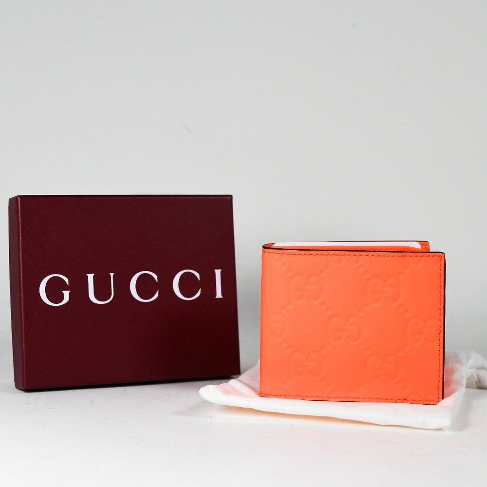 Gucci Super Mini Bi-Fold Wallet in Fluorescent Orange GG Rubber-Effect Leather